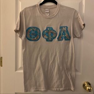 Theta phi alpha beige letters